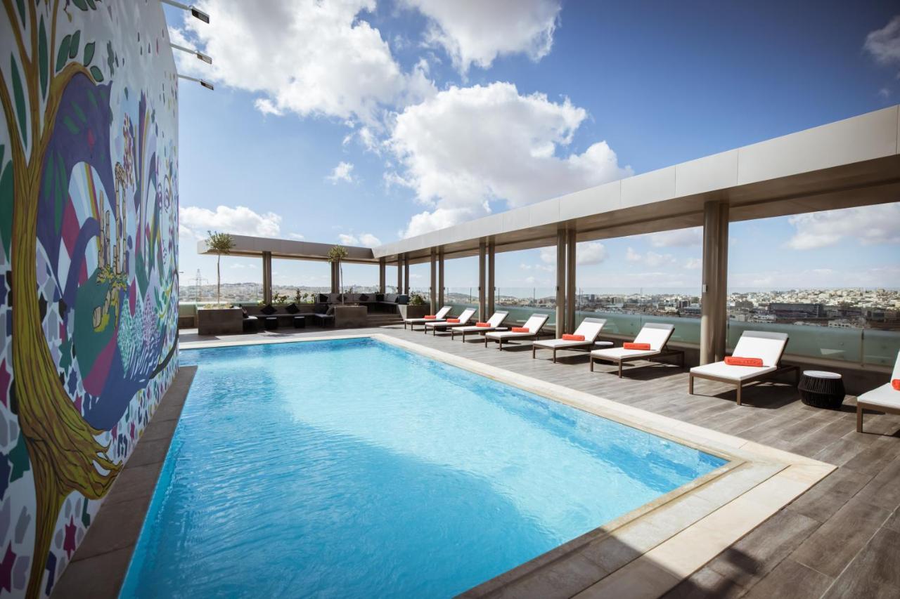 Centro Mada Amman By Rotana Amã Exterior foto