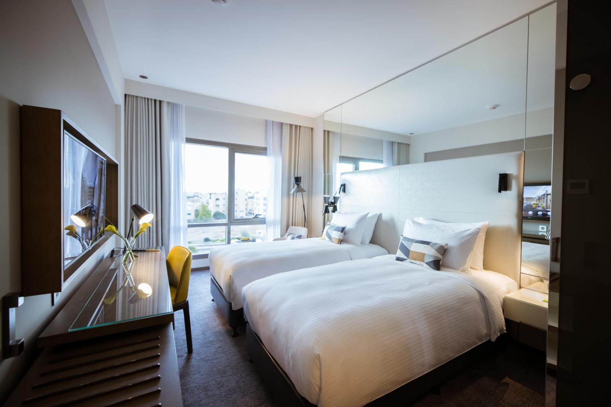 Centro Mada Amman By Rotana Amã Quarto foto